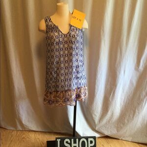 Lightweight sleeveless mini dress in size small